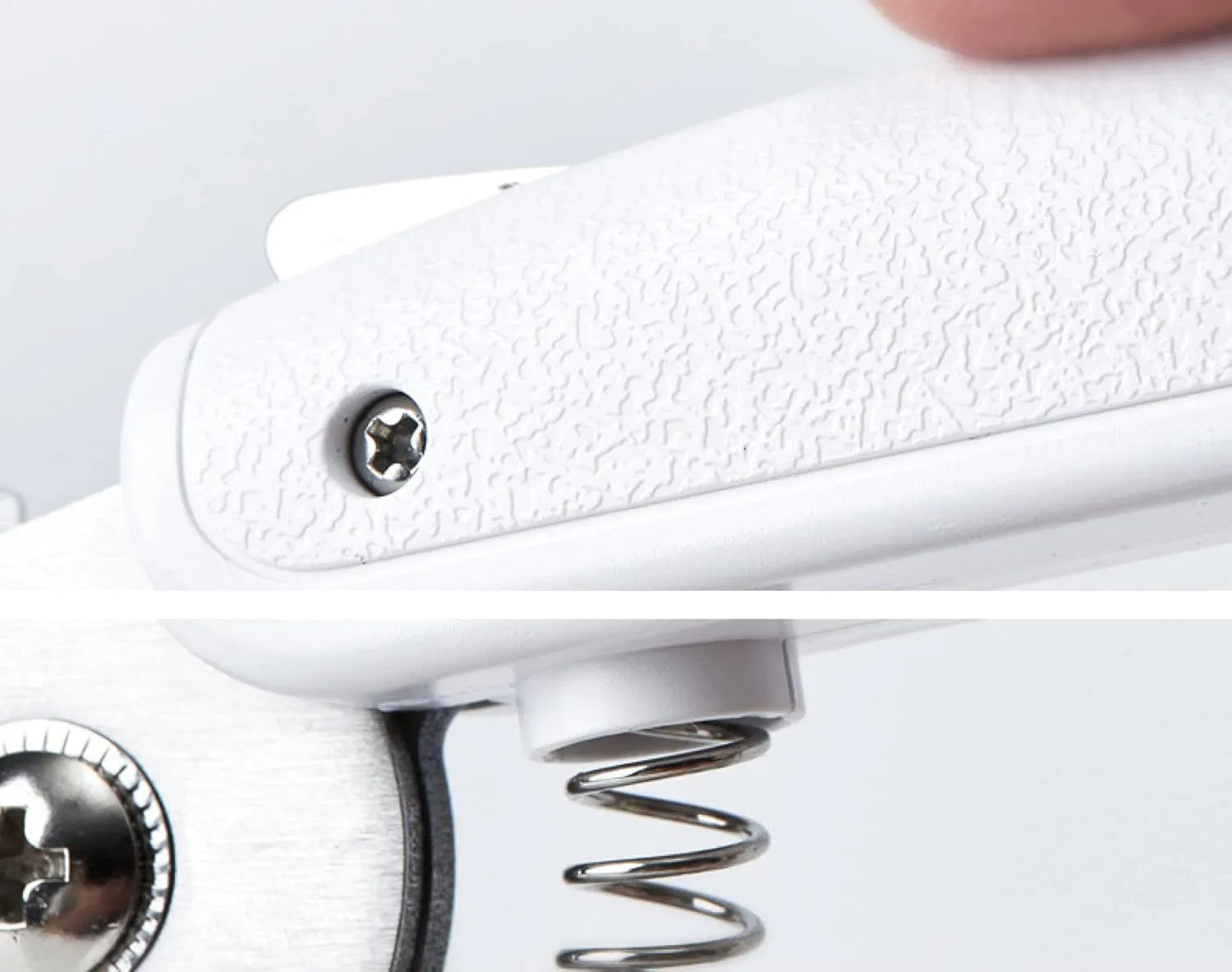 White LED pet nail clipper with transparent anti-splash guard open, showing triangular stainless steel blade