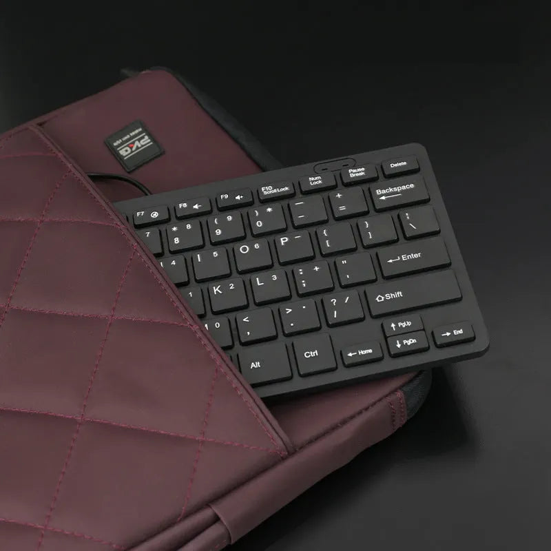 USB wired mini keyboard in black, white, pink or blue colours with compact 280mm design