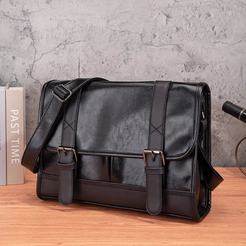 Black Korean style men's anti-theft backpack with PU construction and decorative sewing thread details