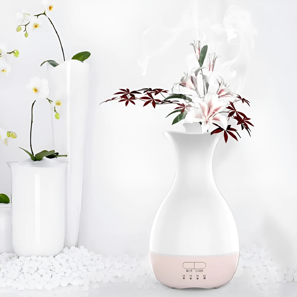 White ultrasonic aromatherapy diffuser with colourful LED light misting essential oils