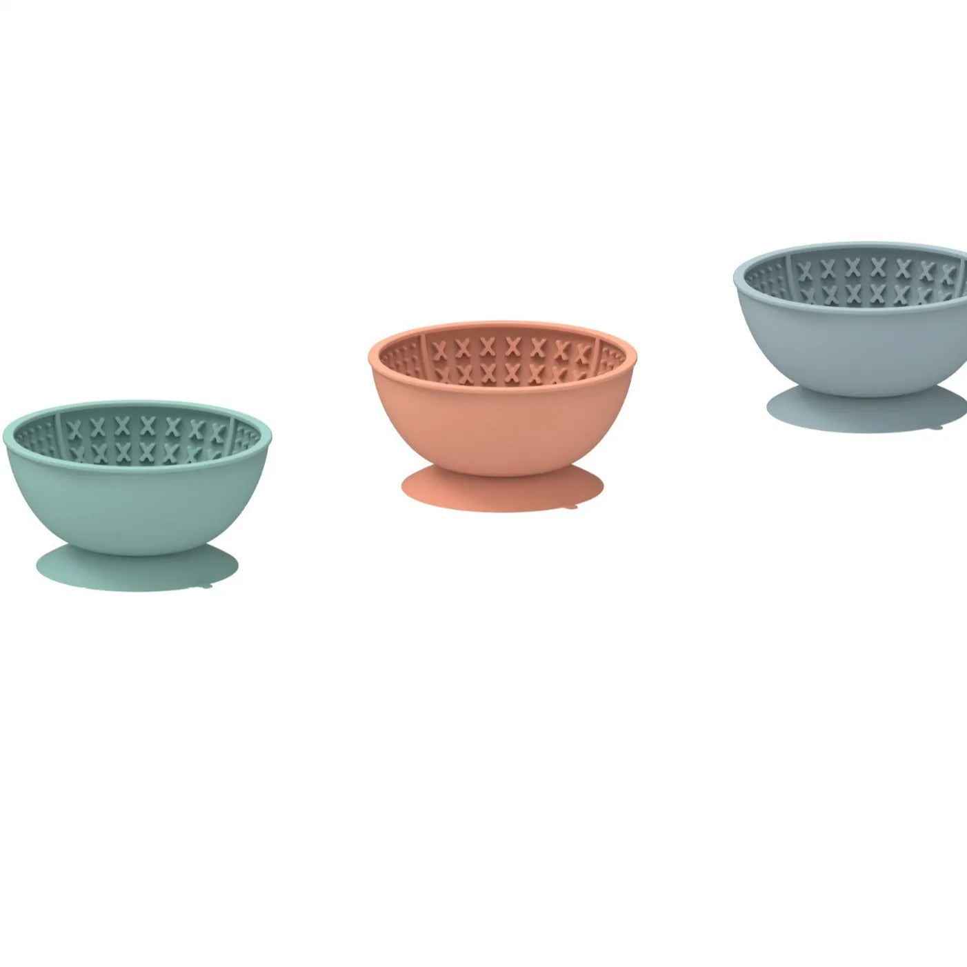Cyan silicone dog bowl with licking mat texture and suction cup base on a hard floor
