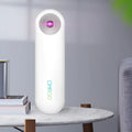 White portable ultraviolet sterilizer lamp showing compact dimensions with disinfection light angle indicator