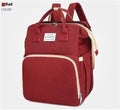 Portable folding mummy bag in multiple colours with a USB port and curved shoulder strap.