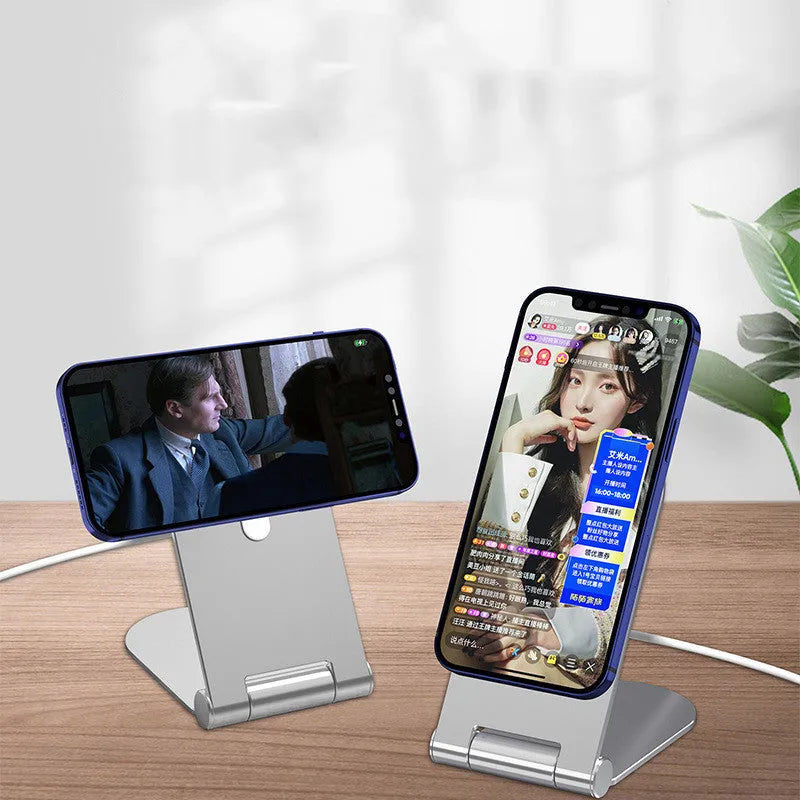 Silver vertical adjustable magnetic bracket for iPhone 12 mounted on dashboard