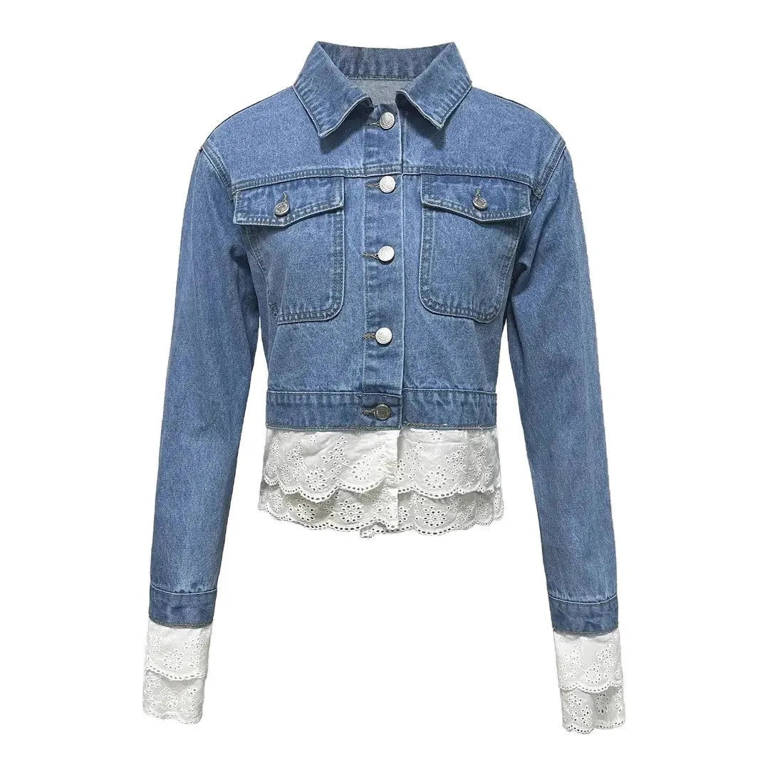 Blue women's denim jacket with lace stitching on the front, shown on a hanger.