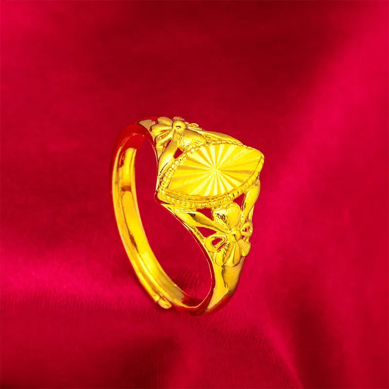 Gold electroplated brass ring with open diamond flower geometric design and textured elements for women