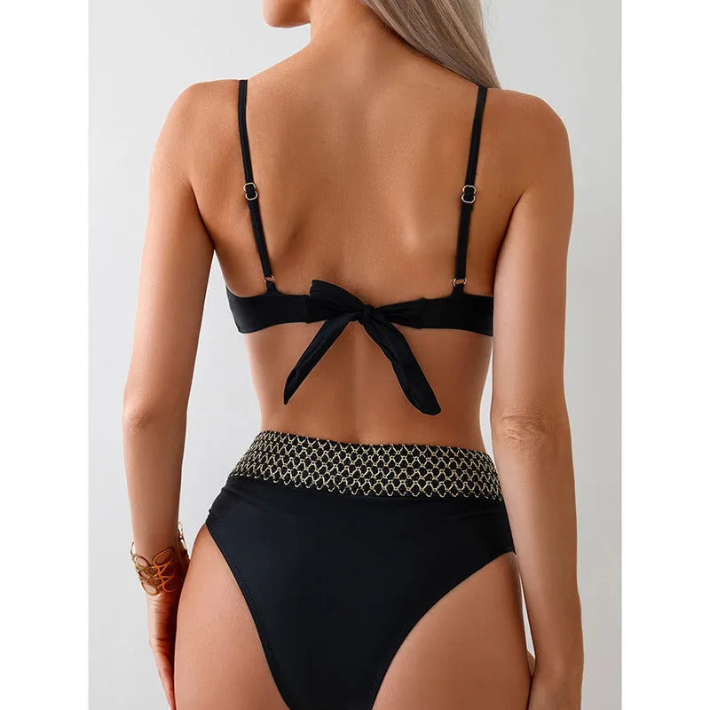 Black European and American style bikini swimsuit briefs set with sleeveless top on a mannequin.