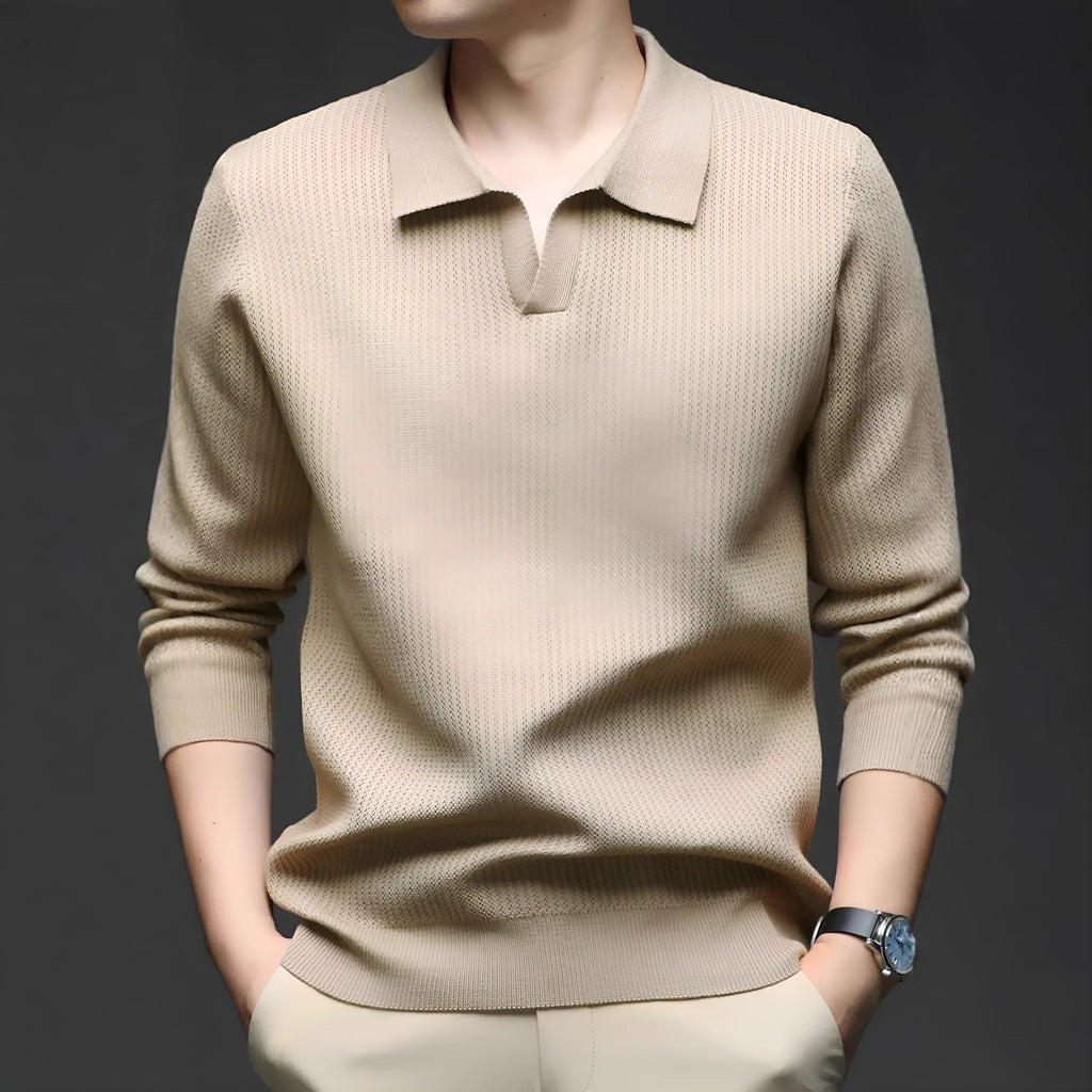 Men's loose green pullover sweater for casual autumn wear on a hanger