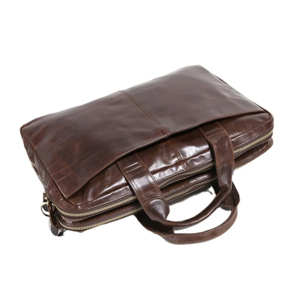 Brown leather business briefcase with 18-inch laptop compartment and professional design