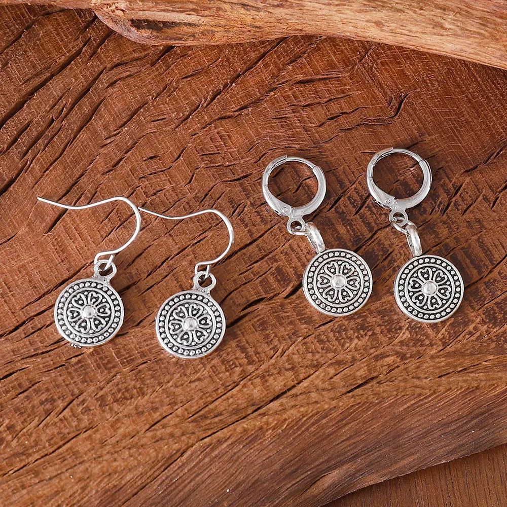 Geometric round earrings with distressed ethnic print in zinc alloy with electroplated finish