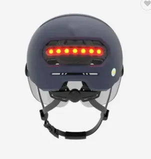 Cycling helmet with built-in rear LED brake light, shown in two style options.