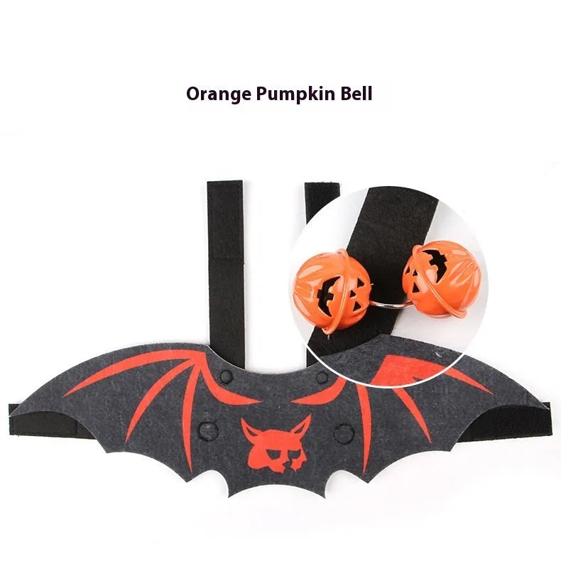 Halloween batwing cloak costume for a cat, made from black and orange felt.