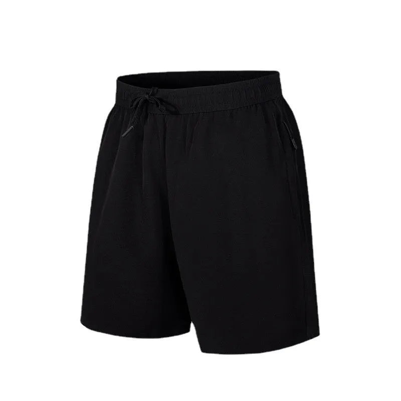 Men's loose fit quick-dry sports shorts in polyester ice silk fabric on mannequin
