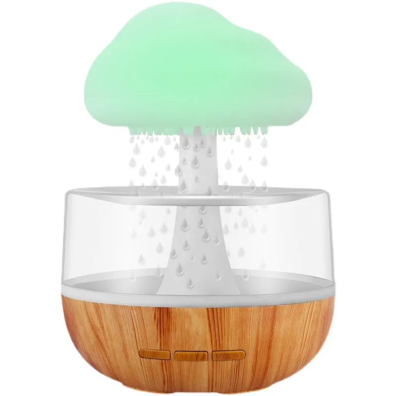 White cloud-shaped humidifier with changing colour lights and water drop display for essential oil diffusion
