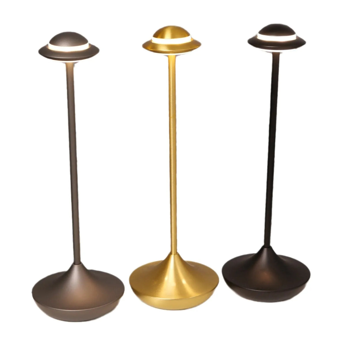 Metallic gold UFO-shaped table lamp with touch dimming on a wooden desk.