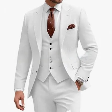 Man wearing a bright red slim fit three-piece suit with waistcoat, suitable for a wedding or business event.