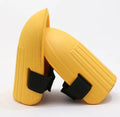 A pair of black and army green EVA foam knee pads for gardening protection.