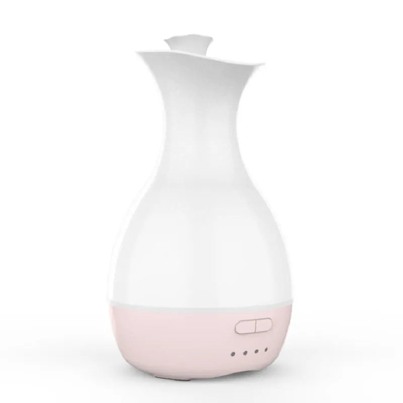 White ultrasonic aromatherapy diffuser with colourful LED light misting essential oils