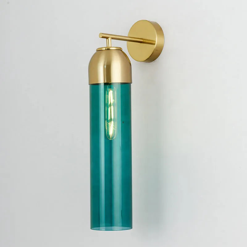 Nordic minimalist glass wall lamp in smoke grey colour mounted on a light wall.