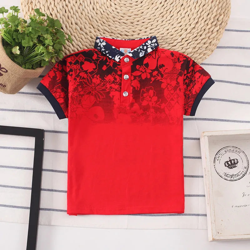 Boys' red cotton short sleeve t-shirt with a lapel collar on a hanger.