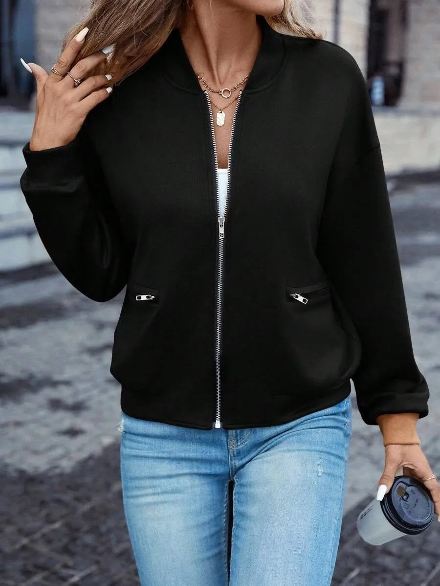 Women's solid black casual zip jacket with faux pockets and long sleeves