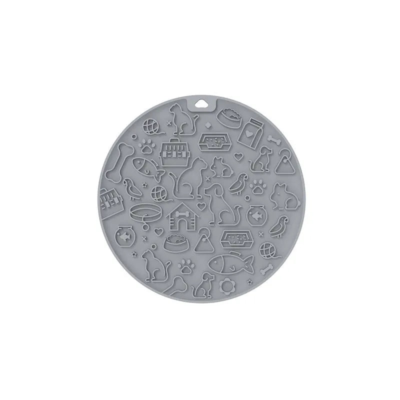Round silicone pet licking mat in mintcream colour with textured surface and non-slip base