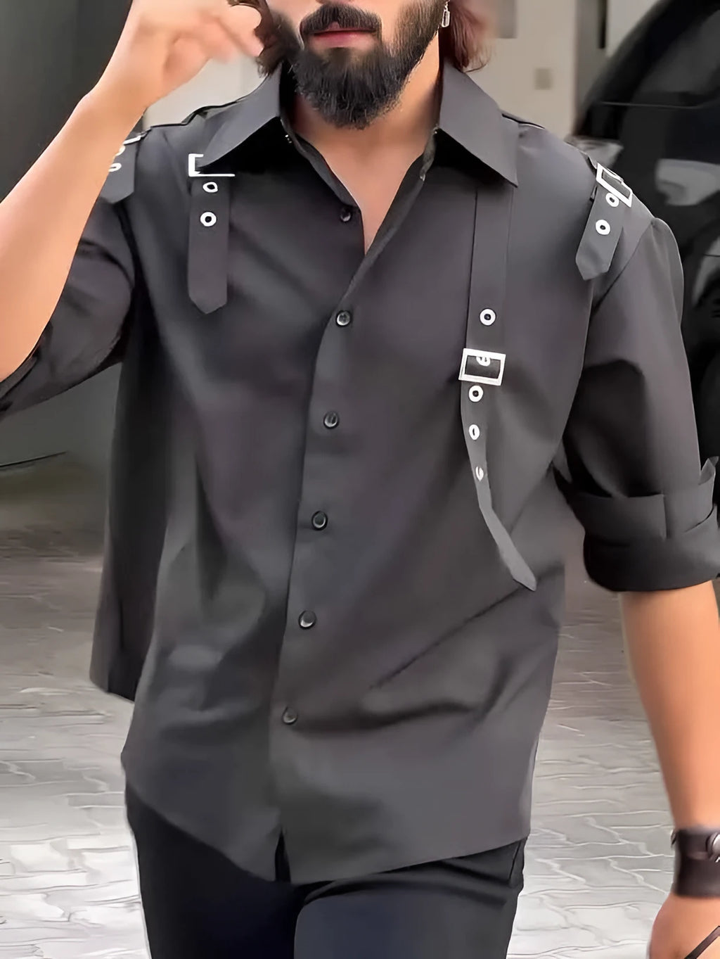 Men's black utility-style button-up shirt made from polyester fabric on a hanger