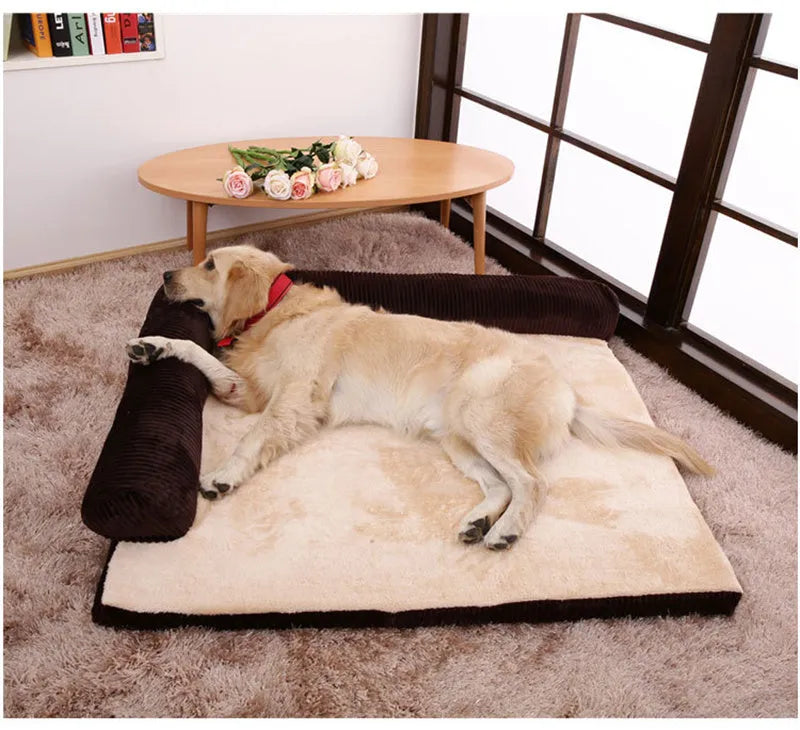 Corduroy pet sofa dog bed with bolster in grey colour, showing non-slip base and high-density sponge padding