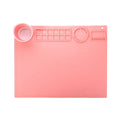 Silicone double bowl painting mat for watercolour art in various colours on a table