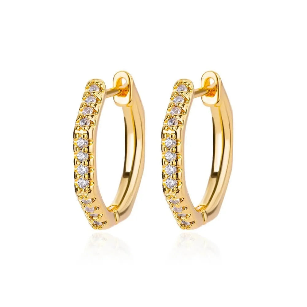 A pair of women's geometric butterfly earrings made from copper with heart, bow, and star shapes in a gold colour finish.