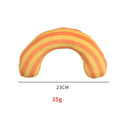 Green, rainbow, and yellow striped cat pillow and noise toy set on a white background