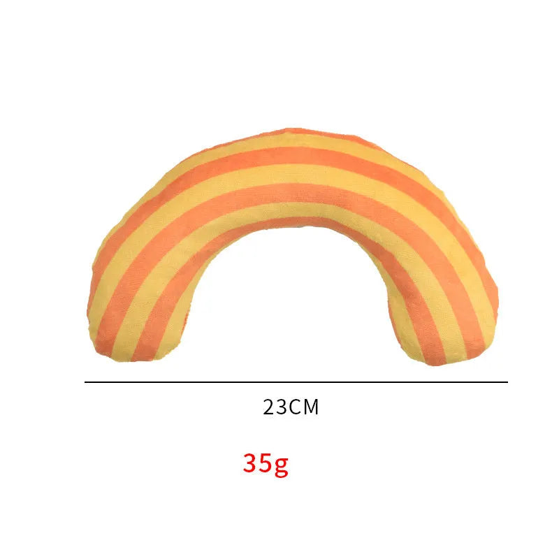 Green, rainbow, and yellow striped cat pillow and noise toy set on a white background