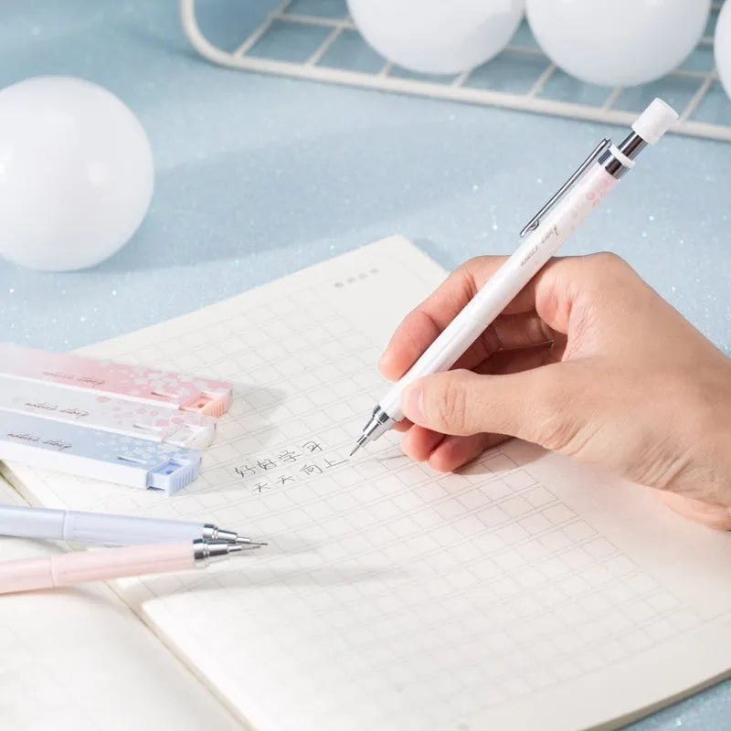 Simplified 0.5mm cartoon automatic pencil set with three pencils and HB refill boxes