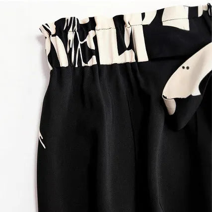 Chinese style mid-length pleated skirt with 3D digital printed plant flower design and splicing detail in DD25052