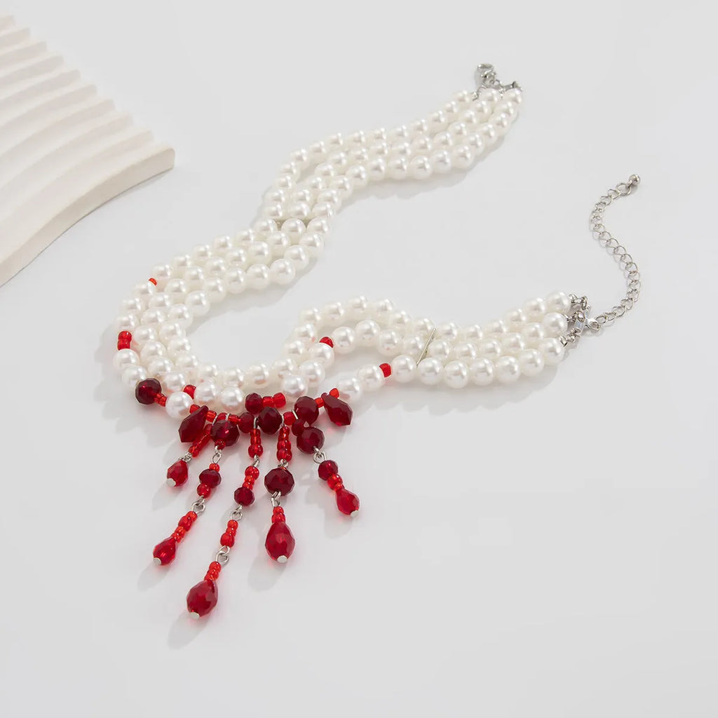 Men's Halloween blood drop tassel necklace with geometric crystal pendant and pearl elements on regular chain
