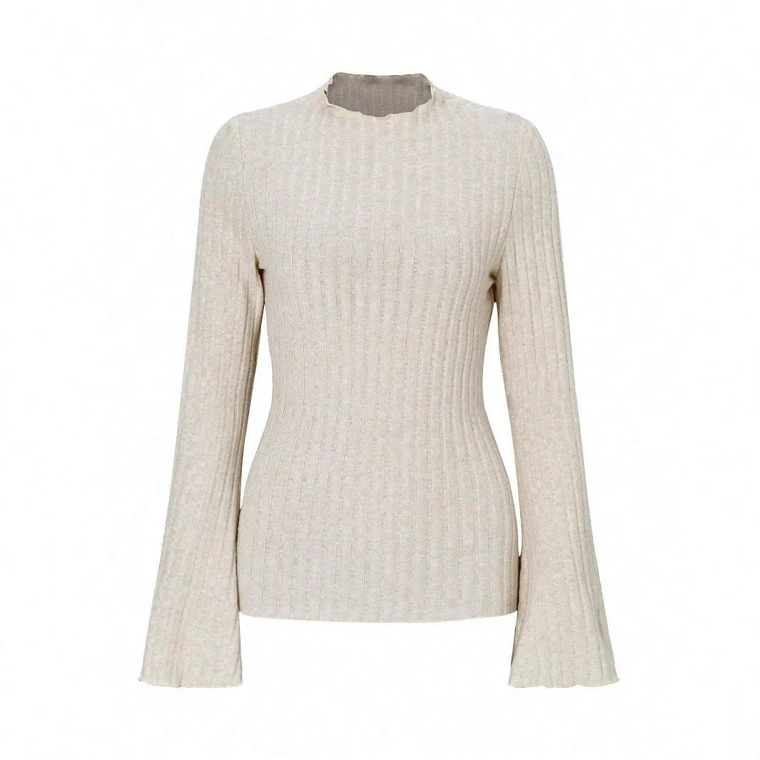 Long sleeve slim fit polyester top with lantern sleeves in black colour, showing round neck design