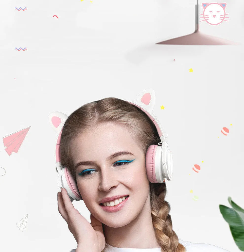 Pink and white wireless Bluetooth headset with over-ear design and 40mm speakers