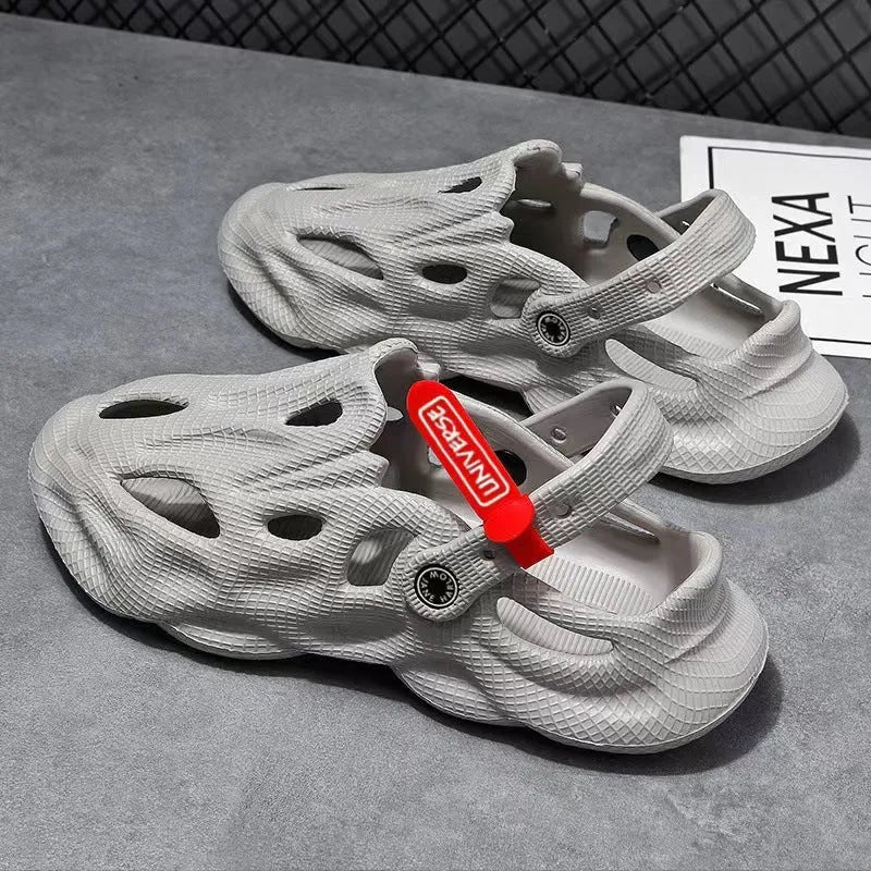 Pair of solid colour closed-toe EVA foam slippers on a neutral background, showing the frosted finish and thickened sole.