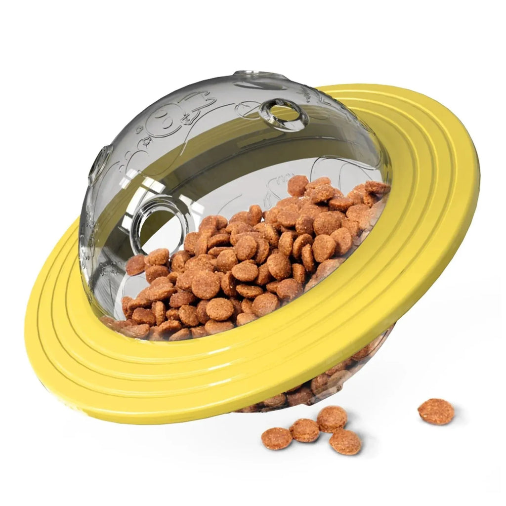 Interactive dog treat ball in blue or yellow with transparent lid for food dispensing and training