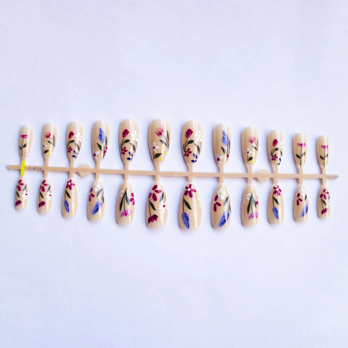 Almond-shaped false nails with rose and tulip floral designs in European and American styles