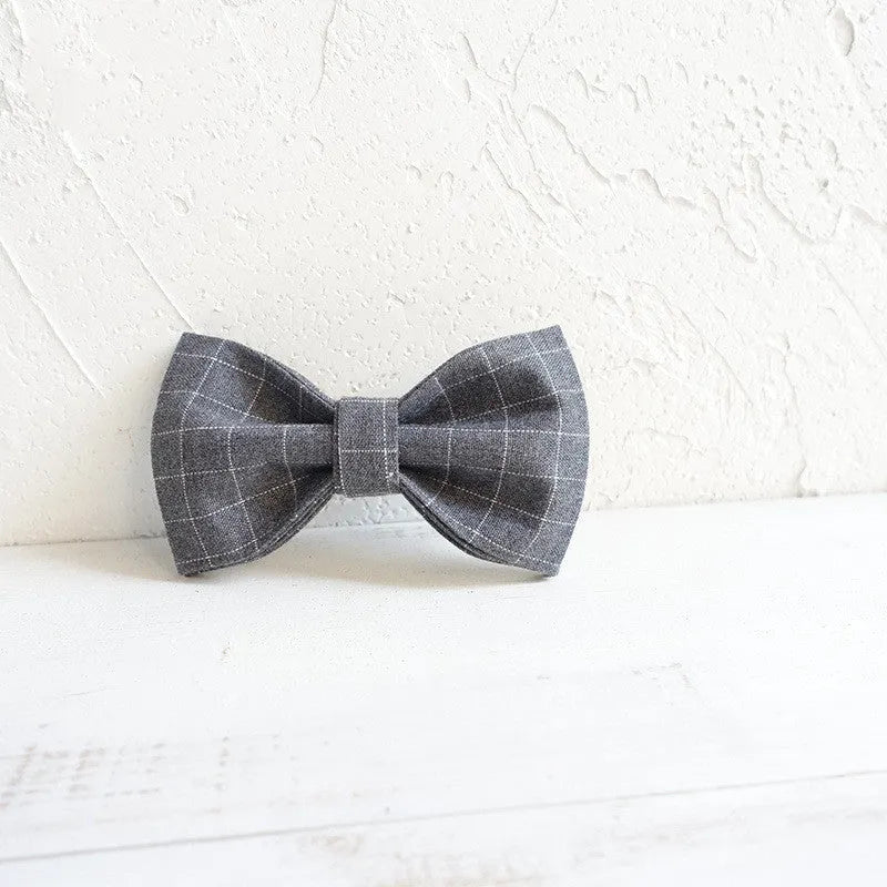 Grey polyester dog bow accessory in five sizes, 10-11cm by 6cm, for dog collars