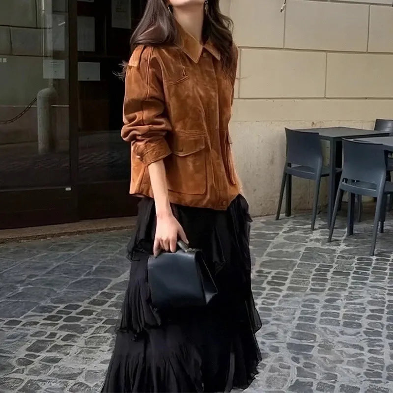 Women's brown suede coat with regular sleeves on hanger