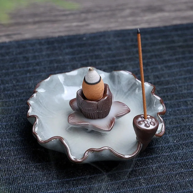 Square ceramic reverse flow incense burner with purple clay construction and lotus plum blossom decoration