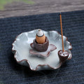 Square ceramic reverse flow incense burner with purple clay construction and lotus plum blossom decoration
