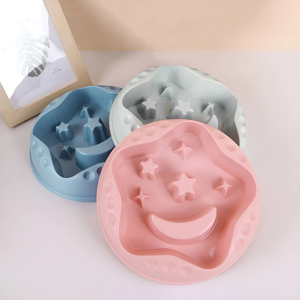 Moon, star, and wing-shaped slow feeder dog bowl in selected colour, showing large capacity food and water design.