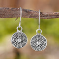 Geometric round earrings with distressed ethnic print in zinc alloy with electroplated finish