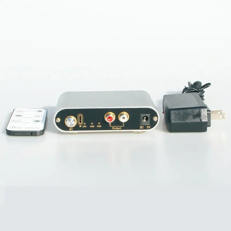 Silver aluminium audio source switch with remote control for multi-source system management