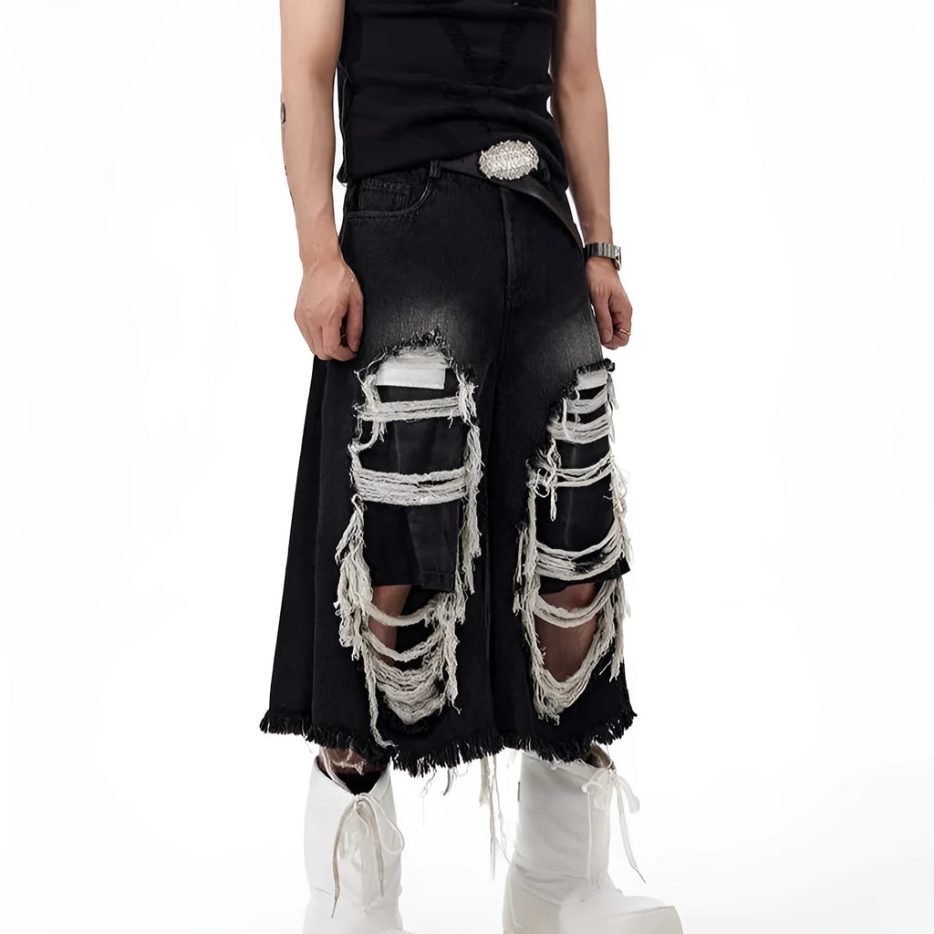 Black women's cropped wide-leg jeans with ripped patch details on a mid-high waist.