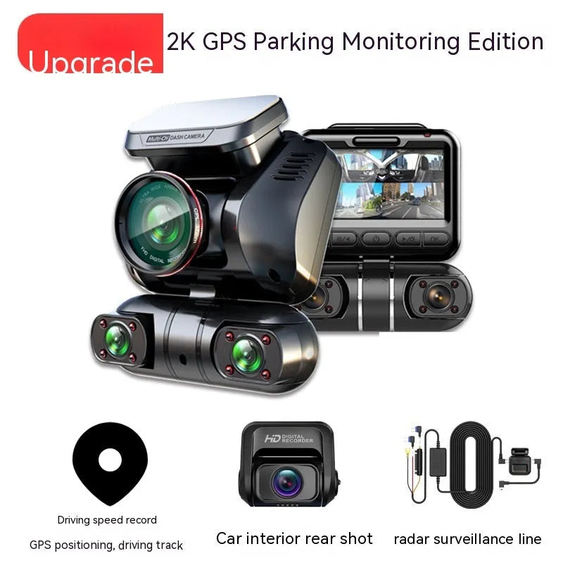 Black four-lens car dashboard camera with a 2-inch screen and compact plastic housing.