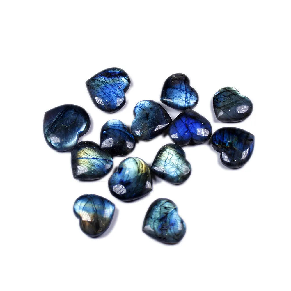 Natural pulled feldspar heart handle pendant in ocean blue moonlight colour on a white background.
